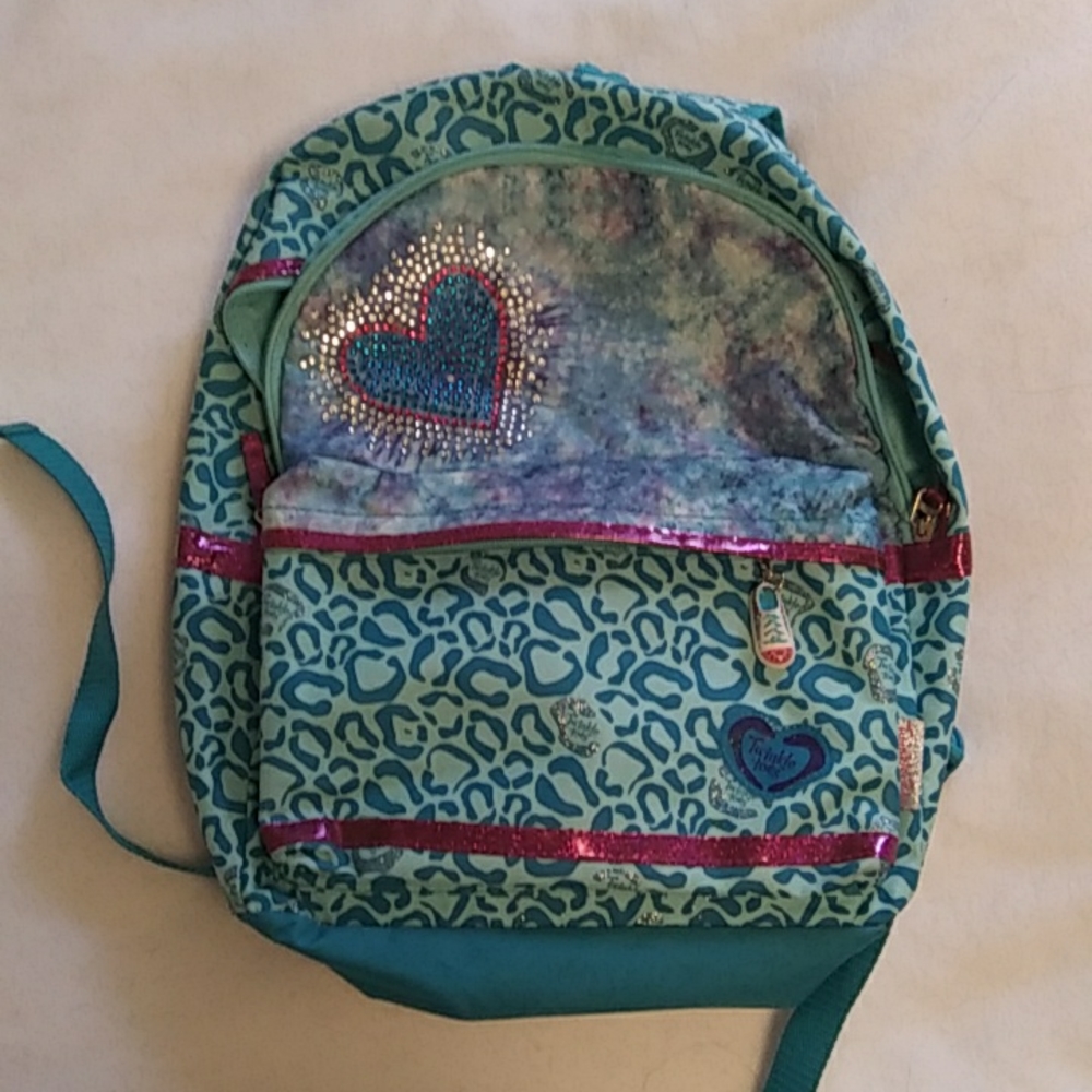 Twinkle Toes Backpack with Lights. Main colors Turquoise and Pink.